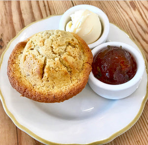 
                  
                    Load image into Gallery viewer, Fresh homemade gluten free and vegan cornbread with a side dish of Guava Brava hot pepper jelly. Sweet and spicy hot jam with guava and fresh peppers tastes delicious with anything corn. 
                  
                