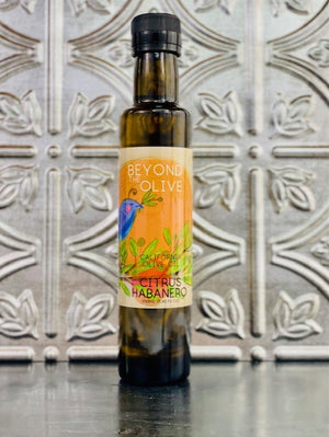 
                  
                    Load image into Gallery viewer, 250 ml dark glass bottlle of Citraus Habanero flavored Olive oil by Beyond the Olive.
                  
                