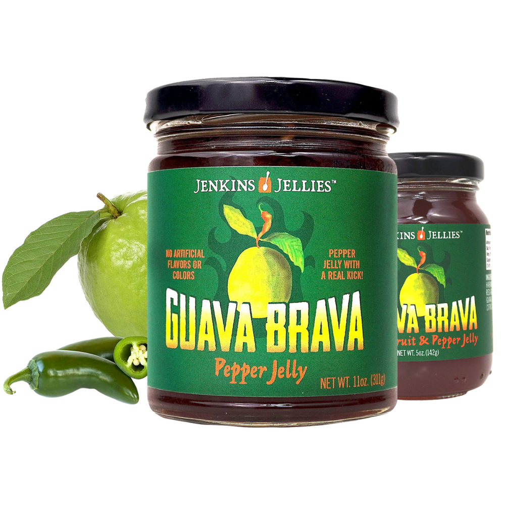 Creamy, fragrant guava brings hints of pear, quice & honey to seven sweet and spicy peppers. This picture exibits 11 oz & 5 oz jars of Guava Brava Hot Pepper Jelly. Vegan, gluten and fat free hot pepper jam perfect for the homecook who enjoys making cornbread, BBQing, sandwiches, pizza and cocktails.